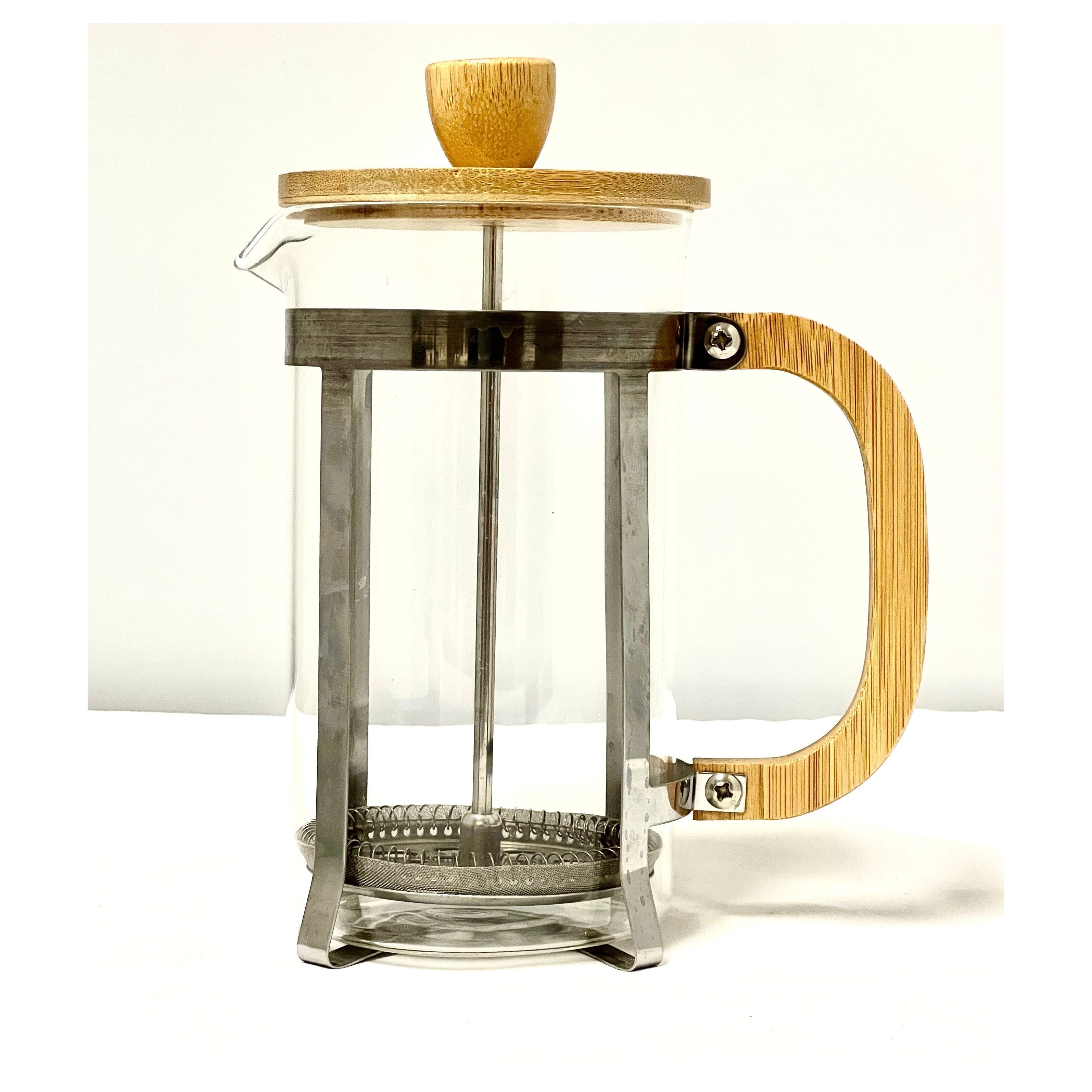 Indulge in sustainable coffee brewing with our eco-friendly French press. Crafted from bamboo and glass, this stylish coffee maker delivers a delicious cup while minimizing your environmental impact.