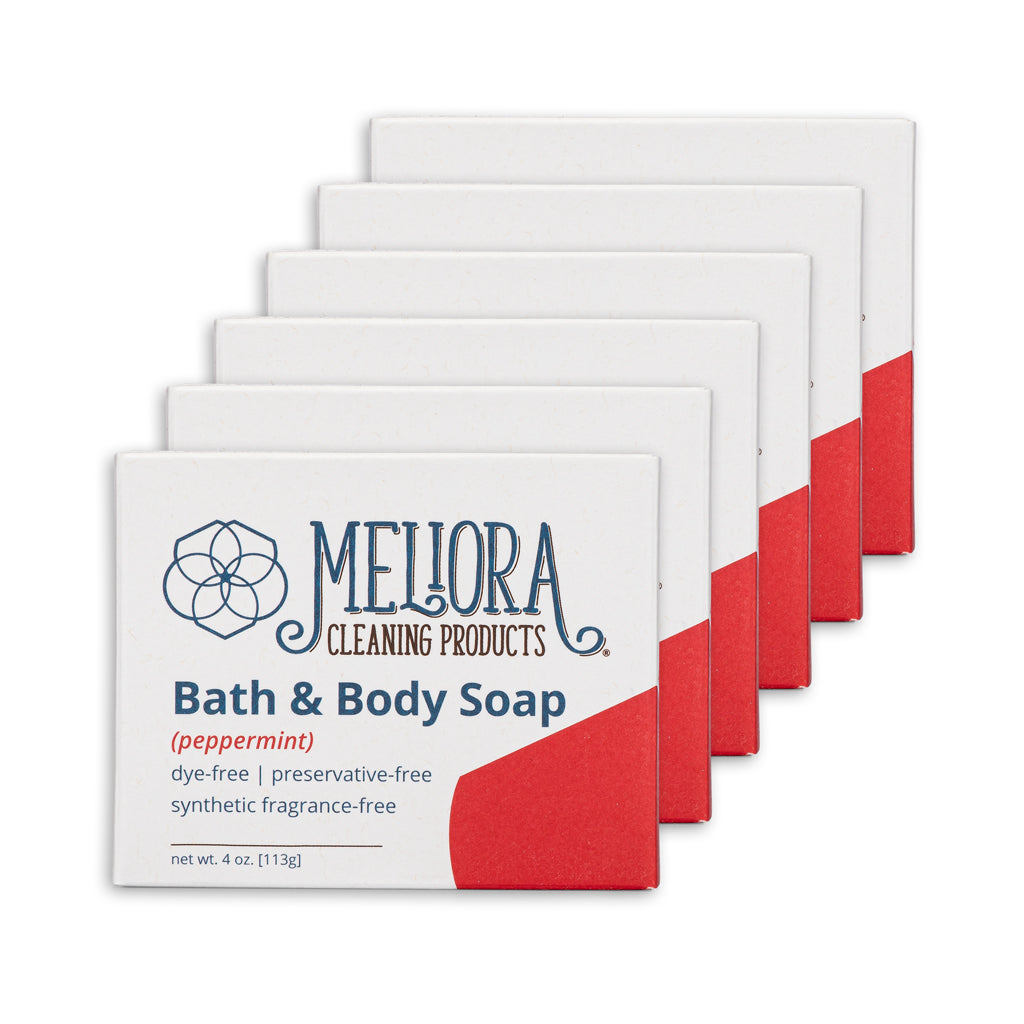 Five bars of Meliora Cleaning Products Bath & Body Soap arranged in a fan shape, showing the front bar with white packaging and red corner accents on a white background.
