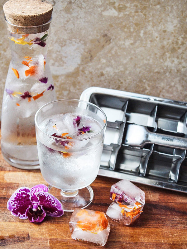 Ecozoi stainless steel ice cube tray with freshly released ice cubes — BPA-free and plastic-free
