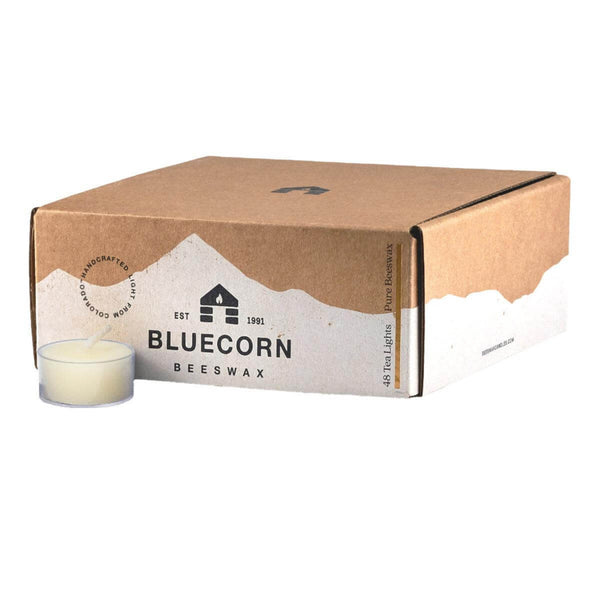 Bluecorn Beeswax candle packaging with a candle on a white background