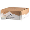 Cardboard box with Bluecorn Beeswax branding on a white background