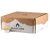Cardboard box with Bluecorn Beeswax branding on a white background