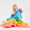 Sarah's Silks eco-friendly rainbow baby blankets folded and stacked showing full product range