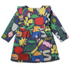 Mon Coeur recycled cotton baby ruffle dress with multicolour shape print and long sleeves, laid flat on a white background