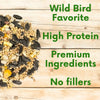 Bird seed mix on a wooden background with text highlighting features