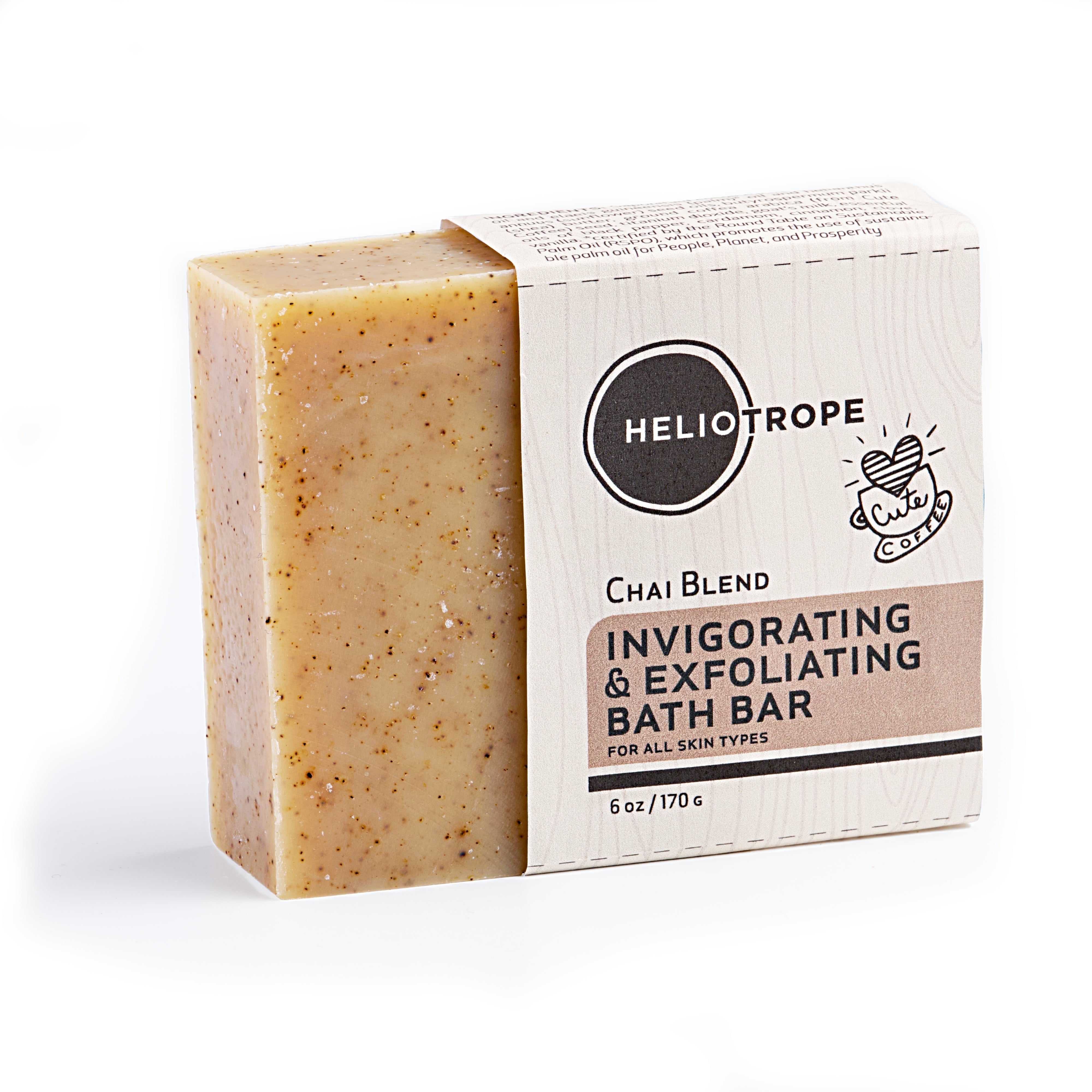 Bar of soap with packaging labeled 'Heliotrope' on a white background