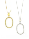 Fair Anita beaded hollow oval pendant necklace in gold and silver-plated recycled metal on a long chain