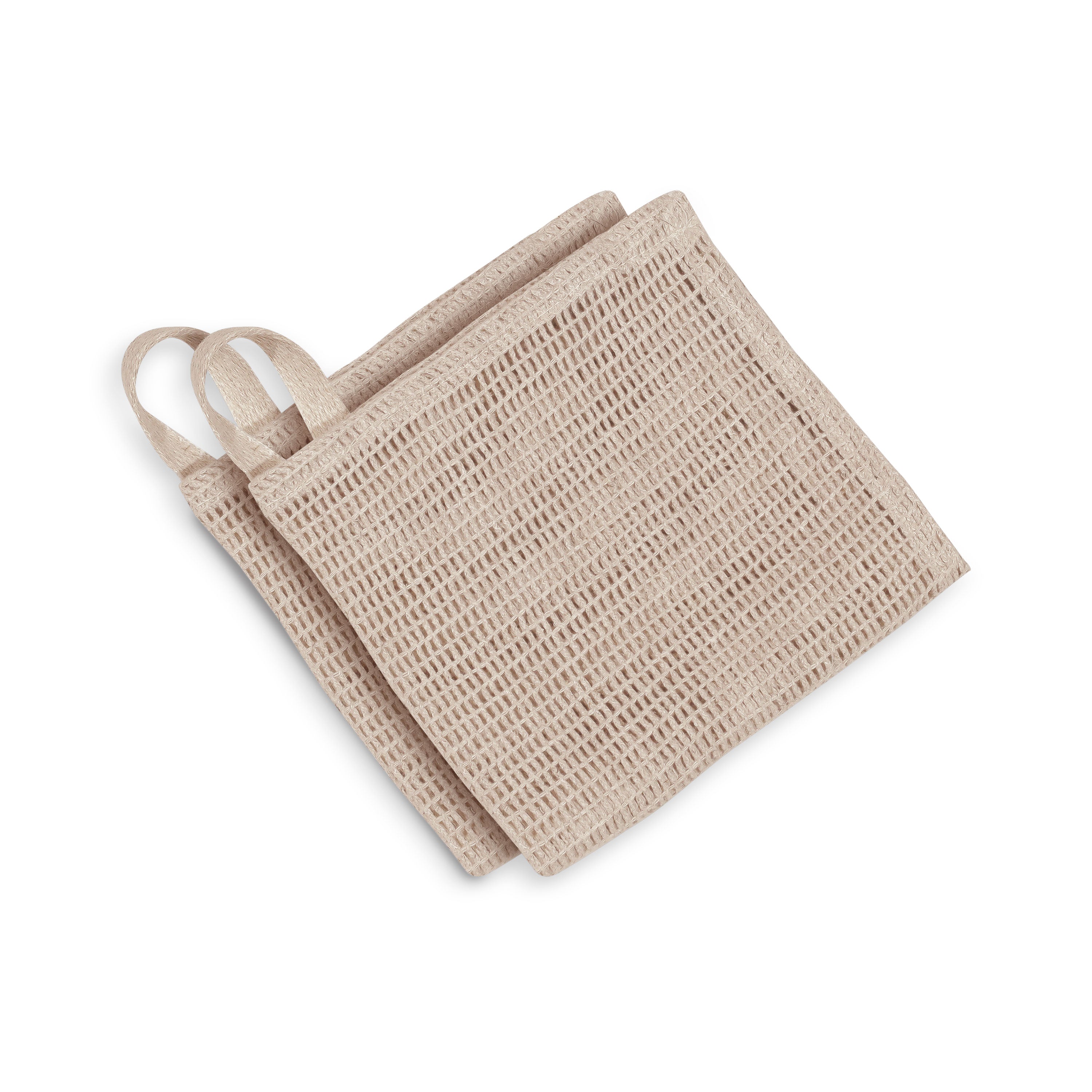 Two beige sponges with handles on a white background