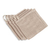 Set of beige washcloths on a white background