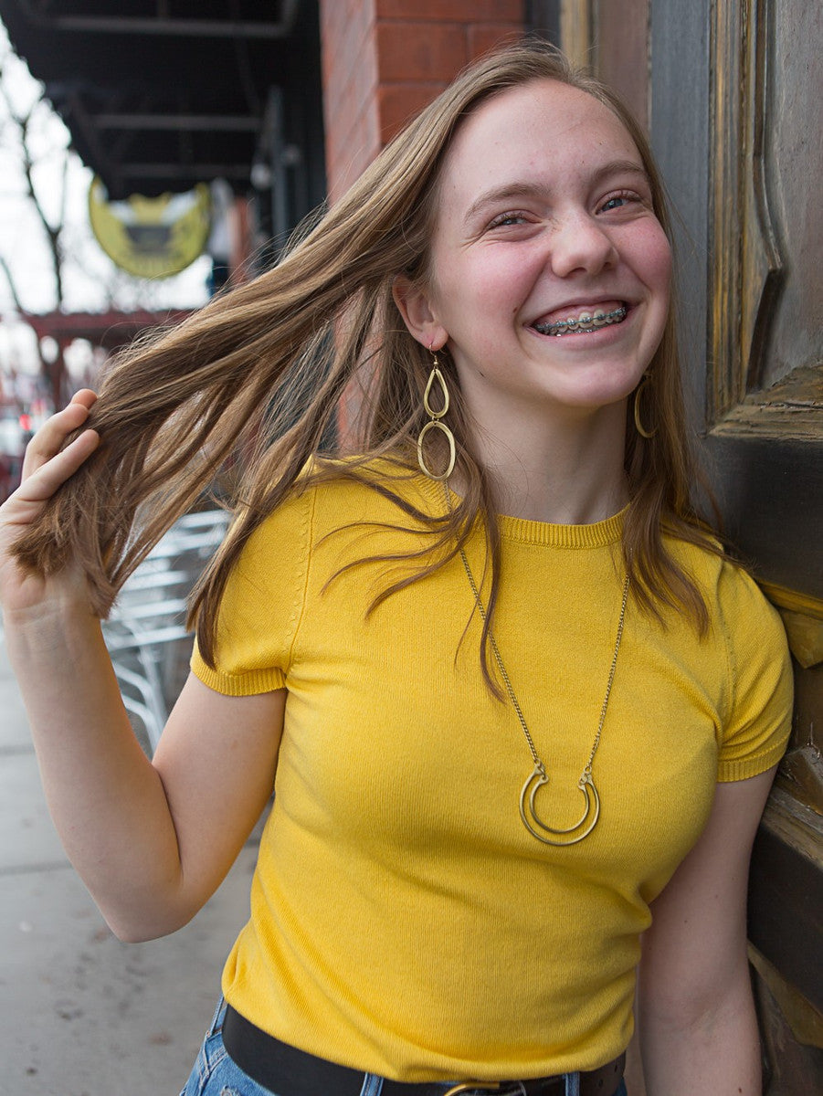 Big brass dangle earrings handmade by Fair Anita women artisans in India