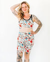 Front view of Inked Up High Rise Bike Shorts featuring whimsical tattoo art characters on fabric