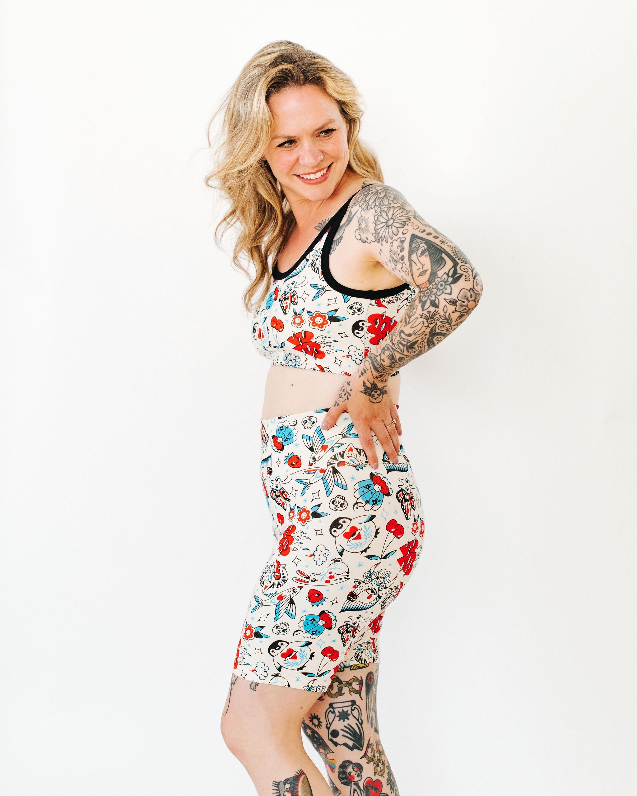 Close-up detail of Inked Up Bike Shorts showing bold tattoo-style illustrated print by Oregon artist Connie Gabbert