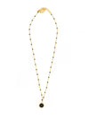 Black beaded gold drop necklace by Fair Anita worn as a layering necklace, fair trade jewelry