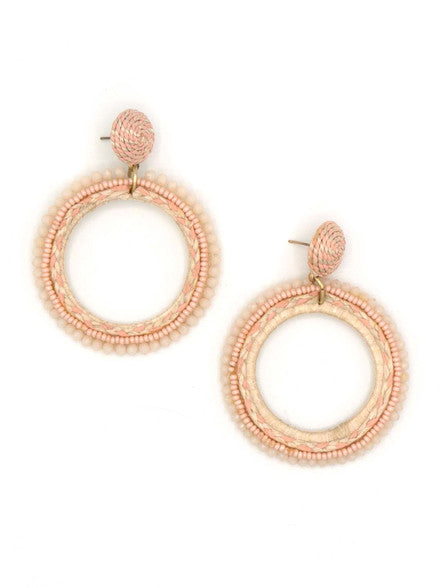 Blush beaded loop earrings by Fair Anita – product flat lay showing full earring detail