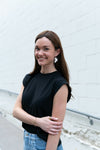 Bone Leaf Earrings styled on model, showing 2-inch drop length and lightweight design