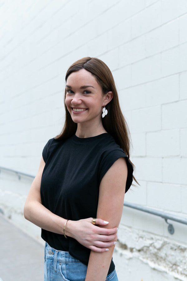 Bone Leaf Earrings styled on model, showing 2-inch drop length and lightweight design