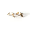 Fair Anita boomerang stud earrings styled and worn, showing size and fit