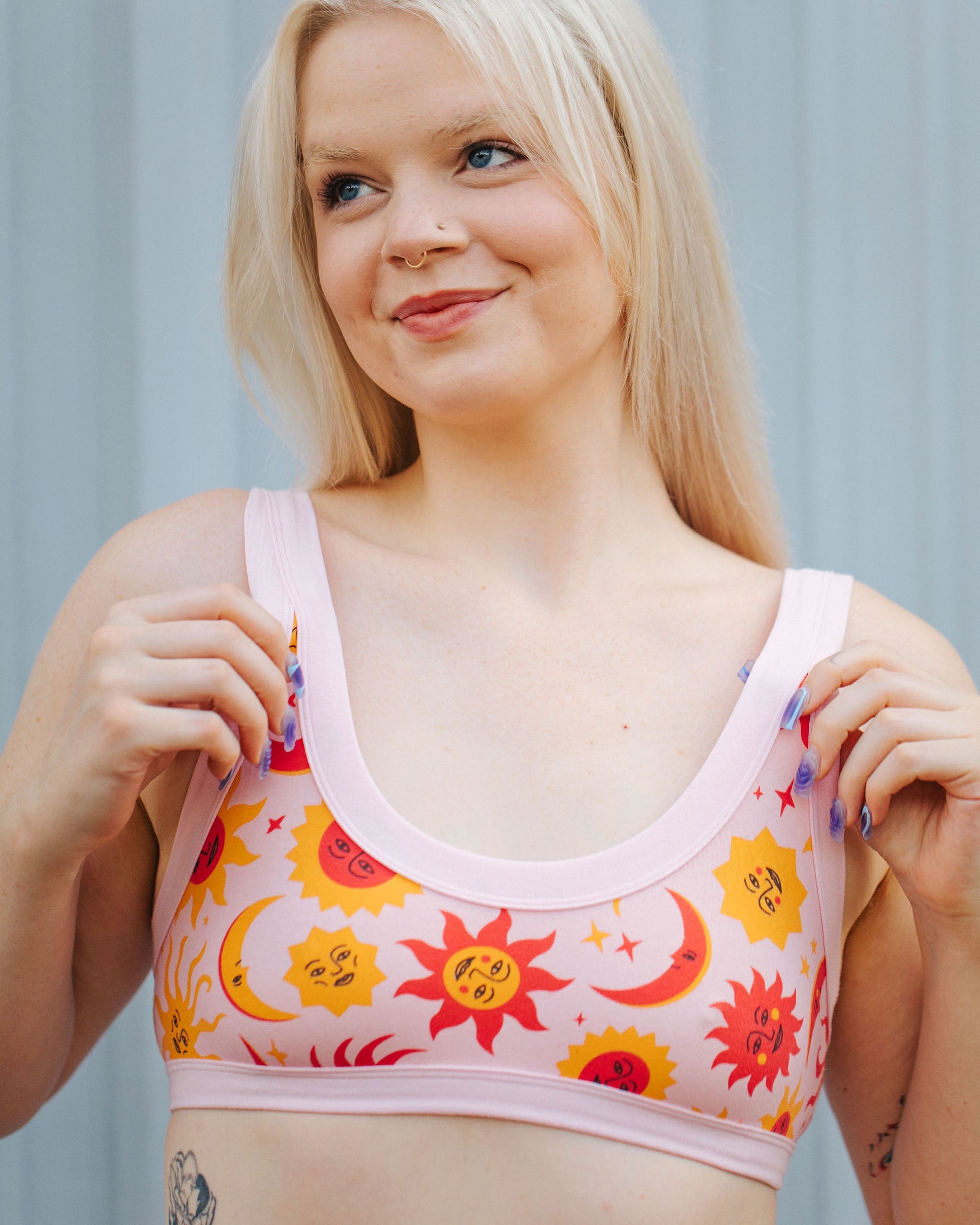 Close-up detail of the Luna y Sol Bralette print showing sun, moon and star motifs