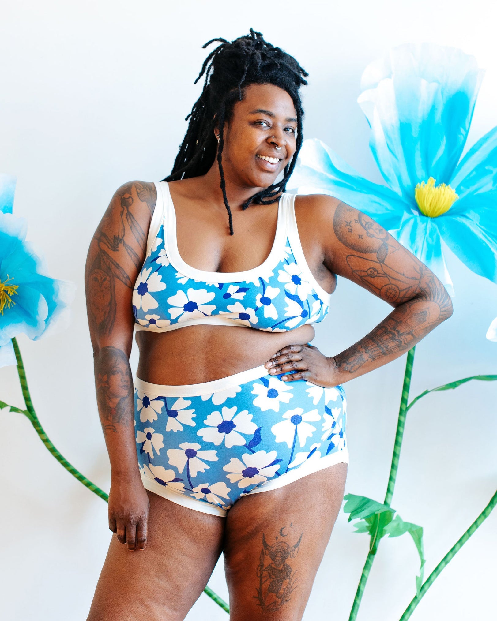 Model wearing Thunderpants USA Moody Blooms Bralette in size 2XL, front view