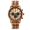 Wooden watch with black face and details on a white background