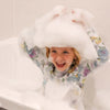 Honeysticks bubble bath bottles in red, yellow, and blue showing color mixing options for bath time play
