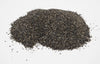 Pile of black pepper on a white background