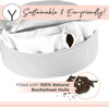 Gray bowl filled with buckwheat hulls, labeled as eco-friendly and containing 100% natural buckwheat hulls.