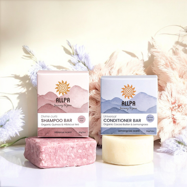 Two Allpa shampoo and conditioner bars with packaging on a light background