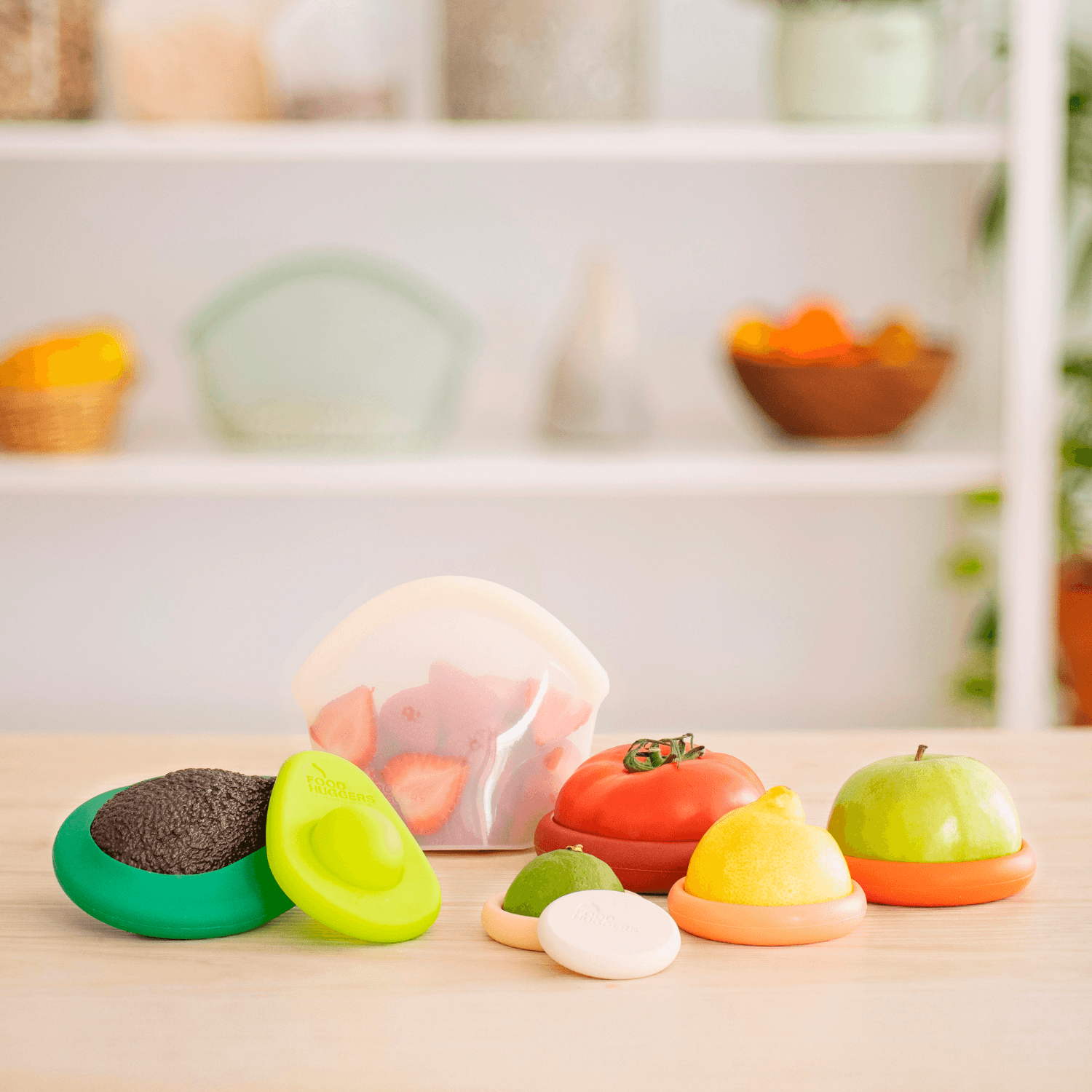 Colorful fruit-shaped bath bombs on a wooden surface with a blurred background