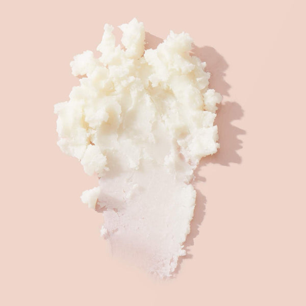Block of mango butter, a natural emollient used in body butter and skin care formulas