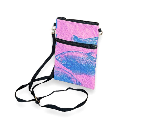 The Breezy Crossbody is the perfect eco-friendly bag for your everyday needs. Made from recycled materials and featuring a stylish design, this bag is both functional and sustainable. Carry your essentials in style and make a positive impact on the environment. Order yours today!