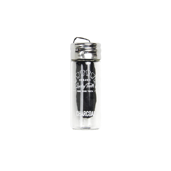 Clear tumbler with black interior and visible branding on a white background
