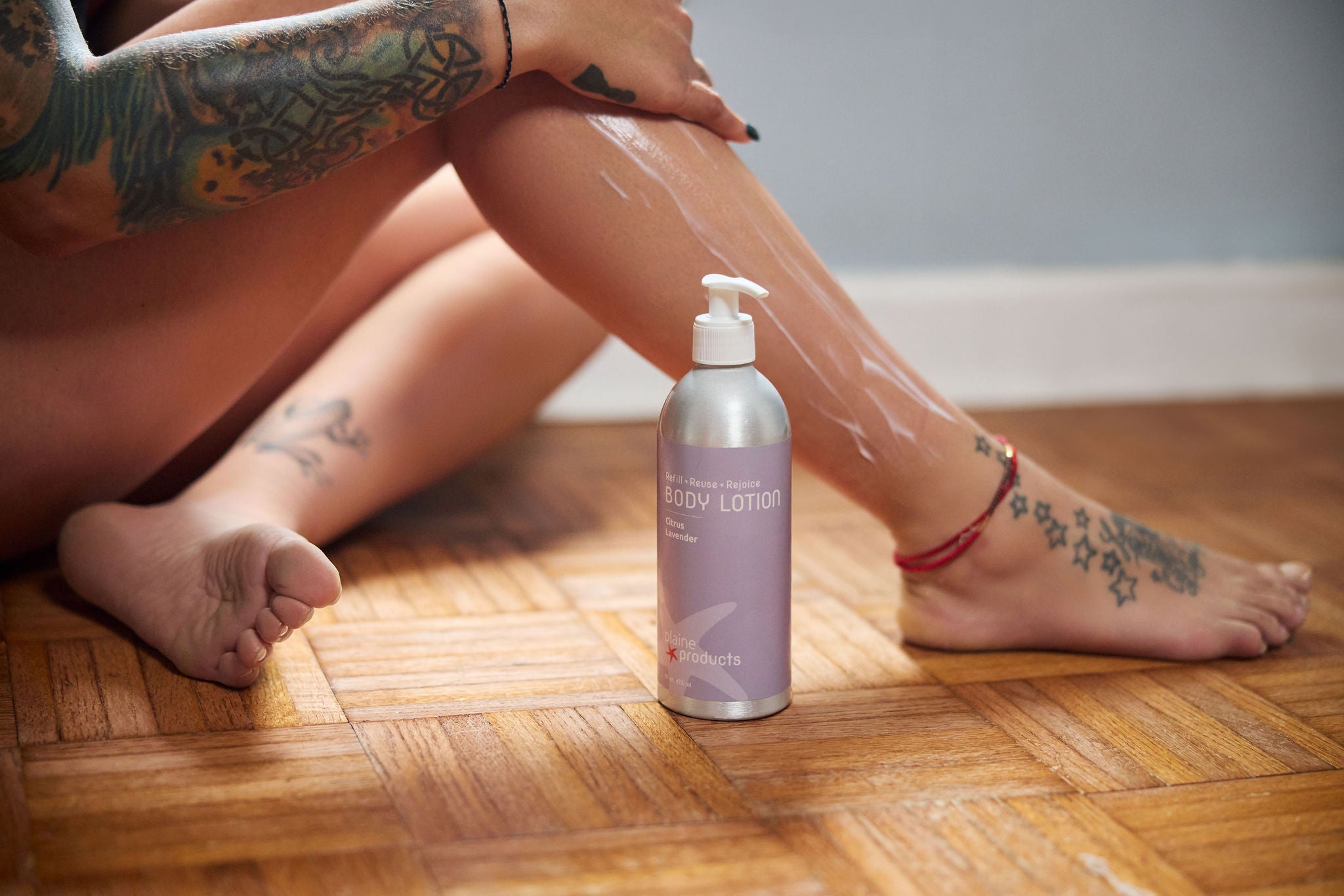 Close-up of Plaine Products body lotion — plant-based moisturiser for soft supple skin