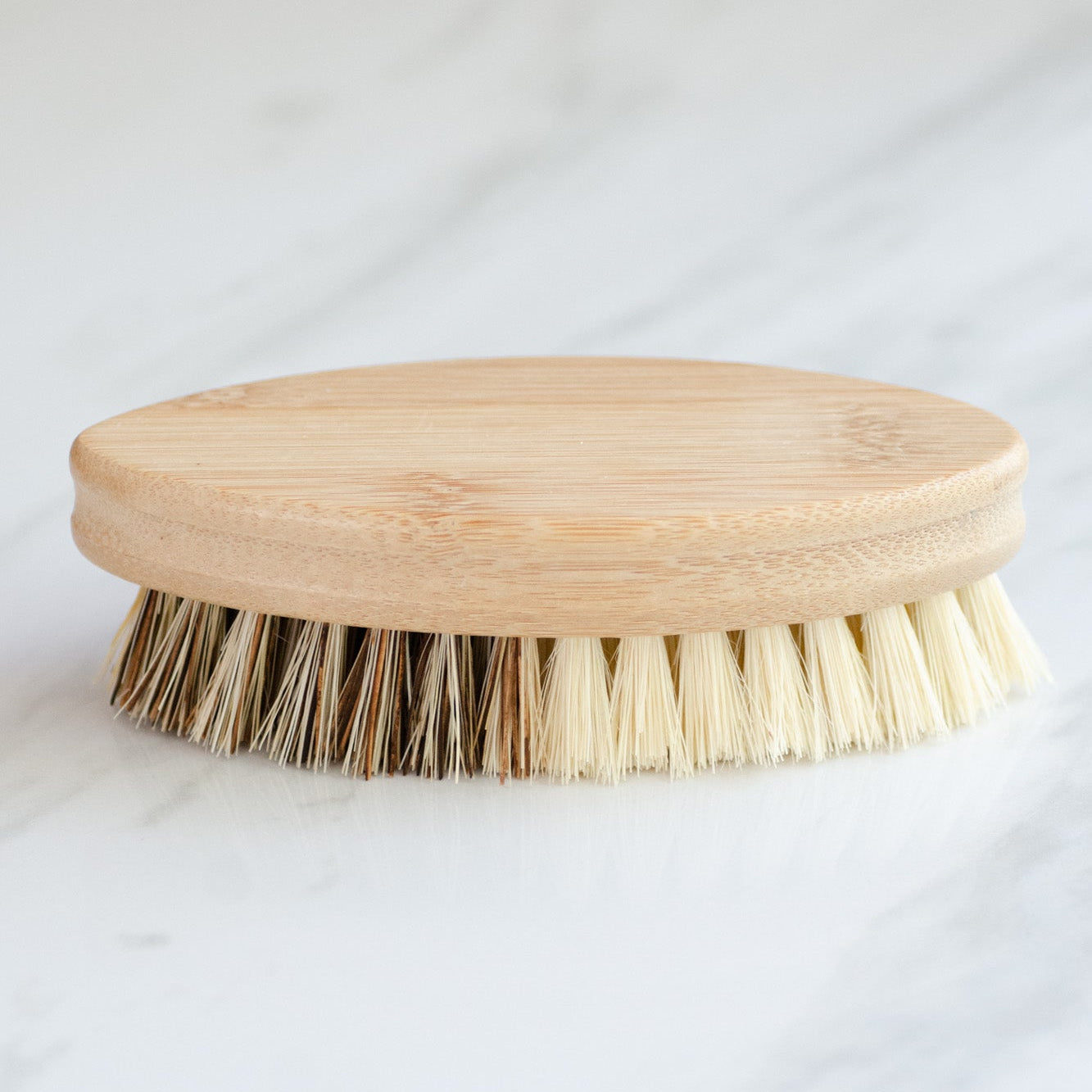 Close-up of CASA AGAVE® vegetable scrub brush dual bristle zones for fruit and root vegetable cleaning