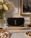 Gold Black Revel by Onali Pure — structured black leather handbag, front view