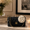 Hand-poured Onali Pure white floral luxury candle with premium wax and sophisticated black and white presentation