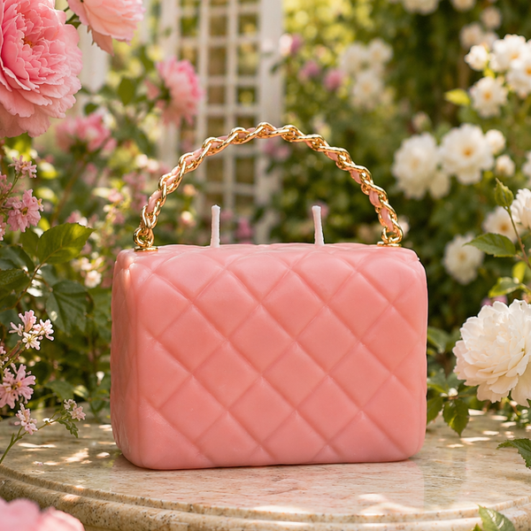 Close-up of The Rose Petite Couture luxury candle — soft pink camellia notes