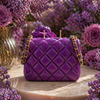 Onali Pure Petite Purple Flower Couture candle styled as a home décor gift on a decorative surface