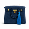 The Bleue Iconic by Onali Pure – luxury decorative candle shaped like an iconic handbag in a rich blue finish