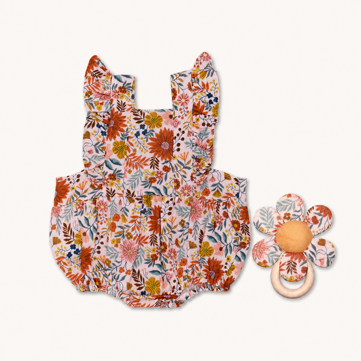 Organic muslin bubble romper and flower teether gift set in Zinnia Bloom floral print by Apple Park