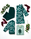 Group of children wearing matching Mon Coeur Snowy Pine T-shirts and joggers in a festive outdoor setting