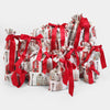 Gift bags with red ribbons on a white background