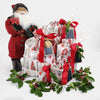 Decorative gift with red ribbons and a Santa figure on a white background