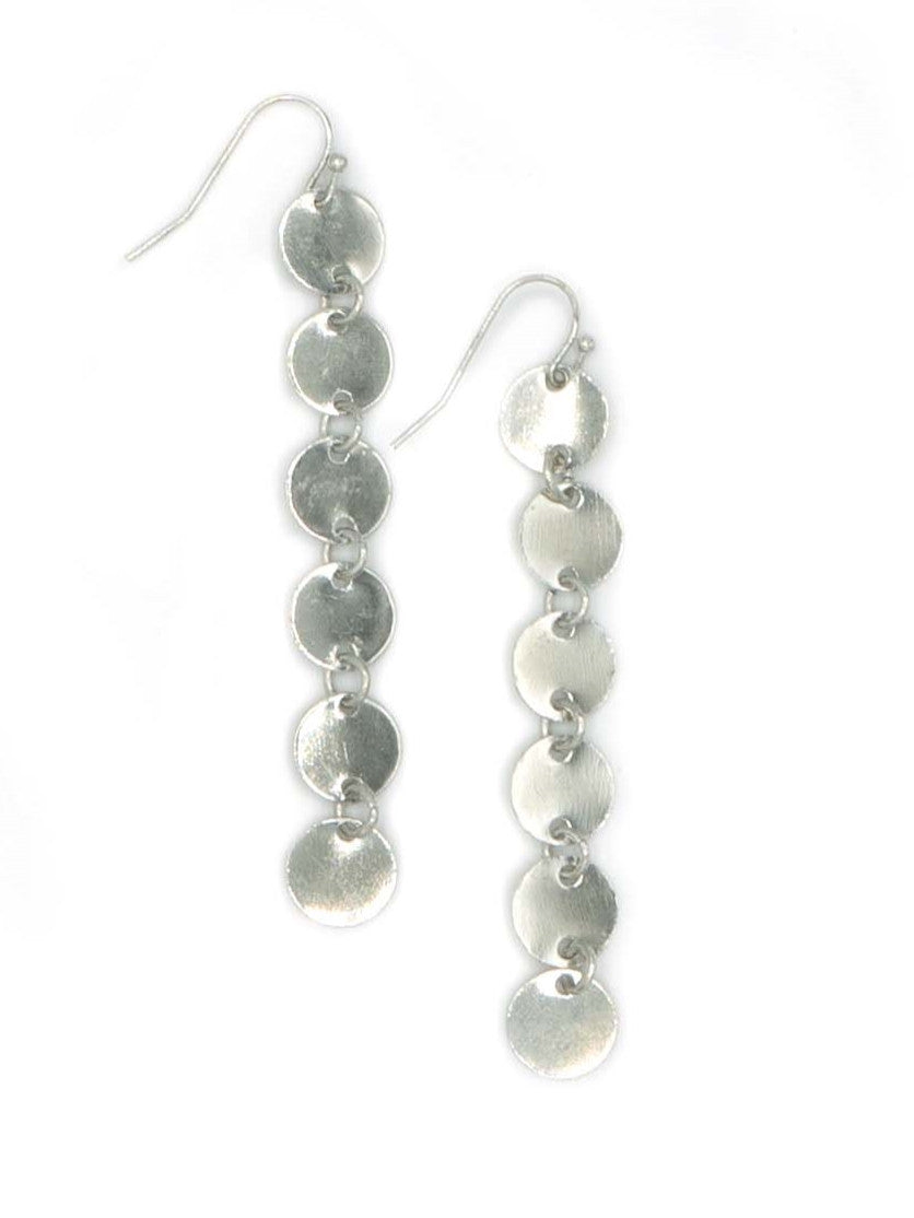 Silver disc earrings on a white background