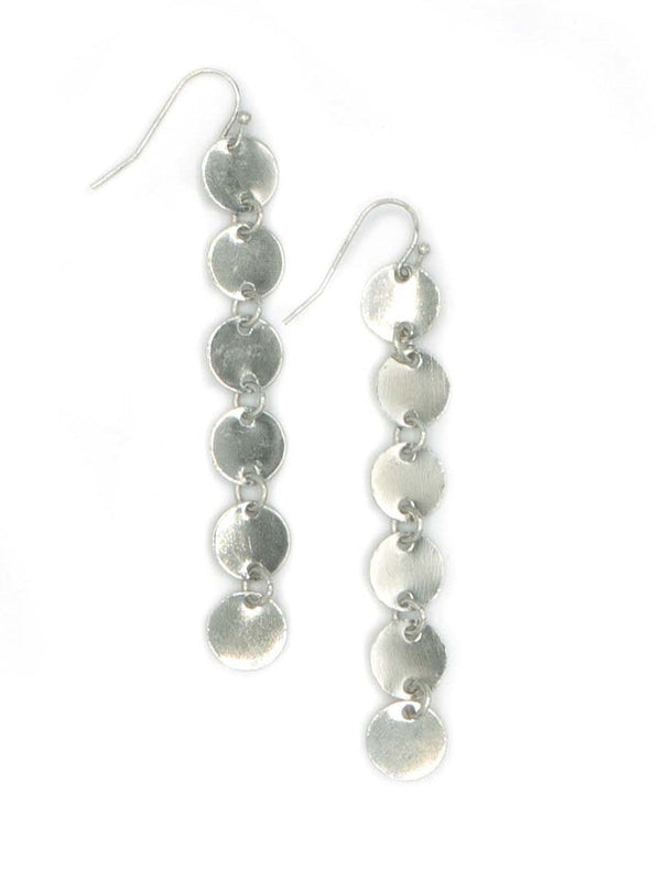 Silver disc earrings on a white background
