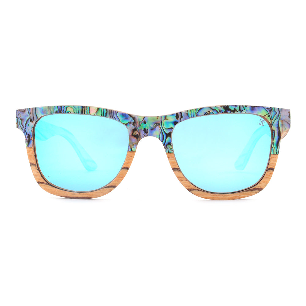 Sunglasses with colorful frame and blue lenses on a white background
