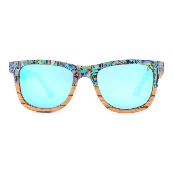 Sunglasses with colorful frame and blue lenses on a white background