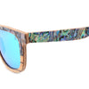 Sunglasses with a colorful abalone shell pattern on a white background