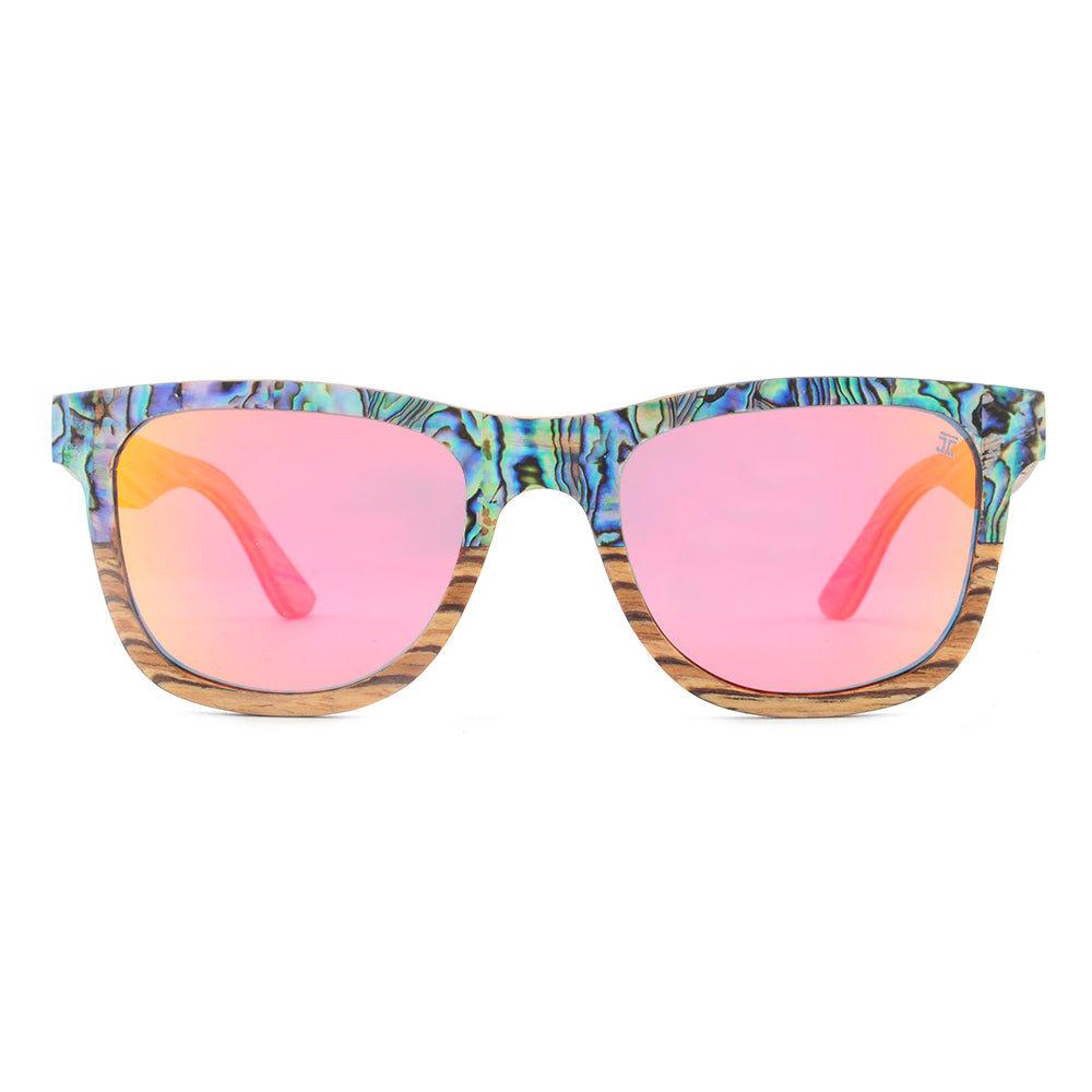 Sunglasses with colorful frame and pink lenses on a white background