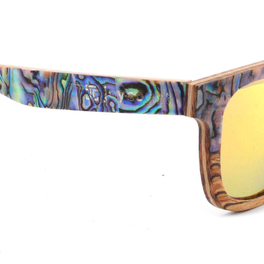 Sunglasses with colorful abalone shell frame and yellow lenses on a white background